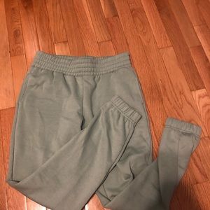 green sweatpants